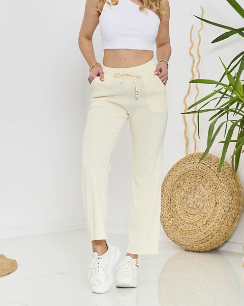 Women's wide corduroy pants in ecru - Clothing