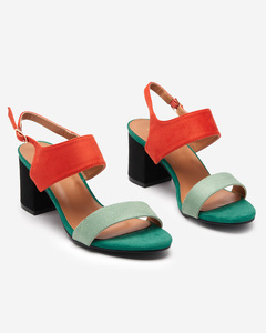 Colorful women's sandals on a post Dominco- Footwear