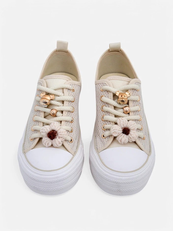 Royalfashion Women's perforated sneakers with embellishments Osdo