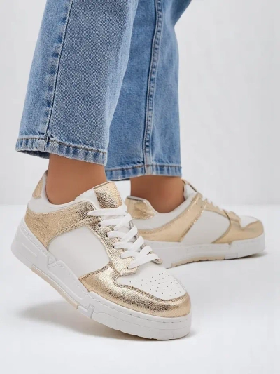 Royalfashion Women's sporty sneakers on a thicker sole Golden Hour