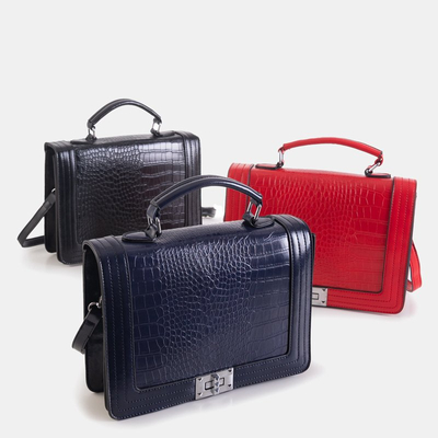 An elegant navy blue embossed handbag - Handbags