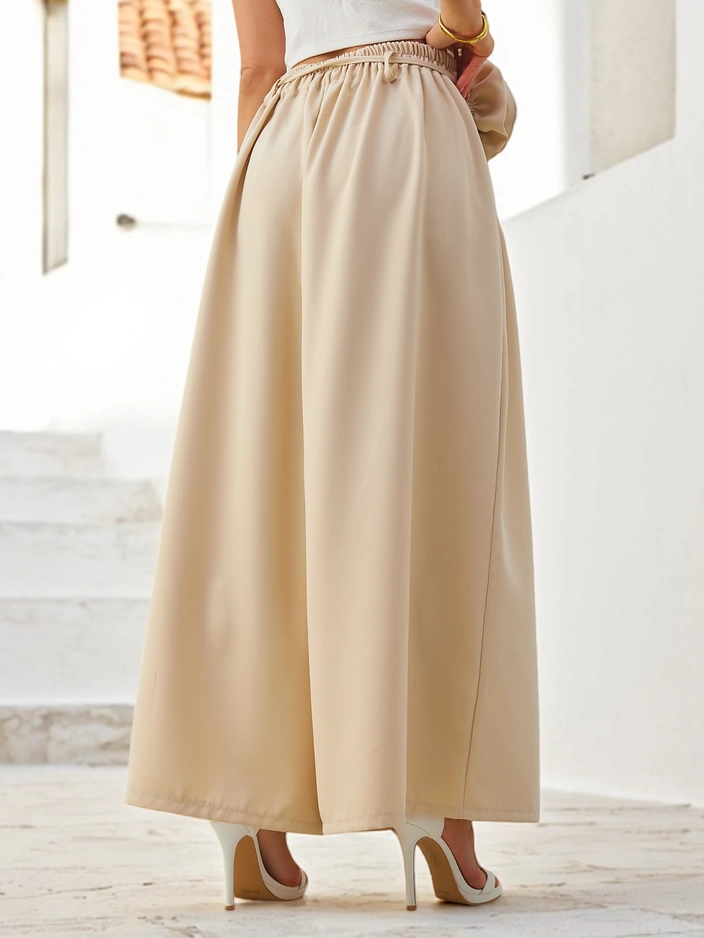 Royalfashion Elegant wide women's trousers with a decorative flower at the waist