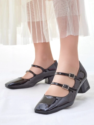 Royalfashion Glossy women's heeled pumps with straps Vible
