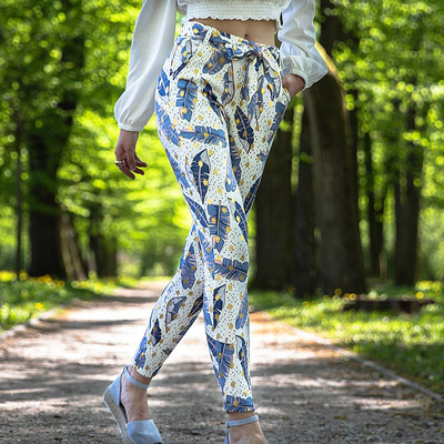 Белые женские штаны с принтом