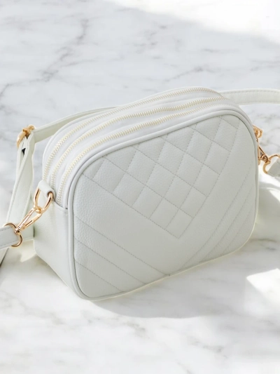 Royalfashion Small women's handbag made of eco-leather with embossing