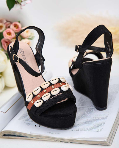 Black women's Nelita sandals on heels