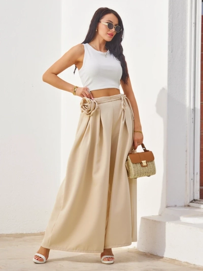 Royalfashion Elegant wide women's trousers with a decorative flower at the waist