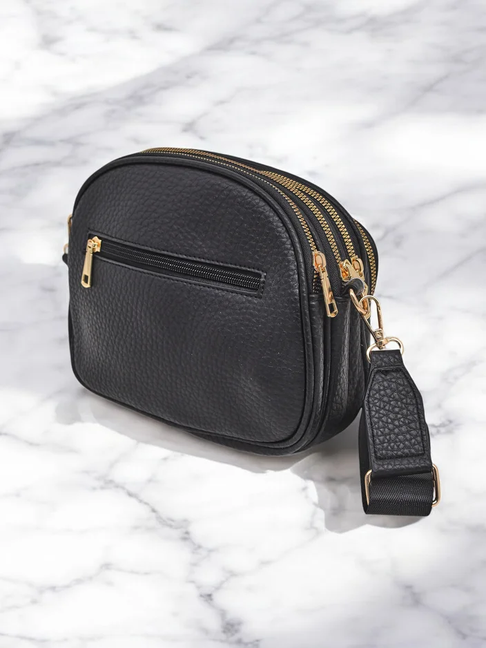 Royalfashion Oval small women's handbag made of eco-leather