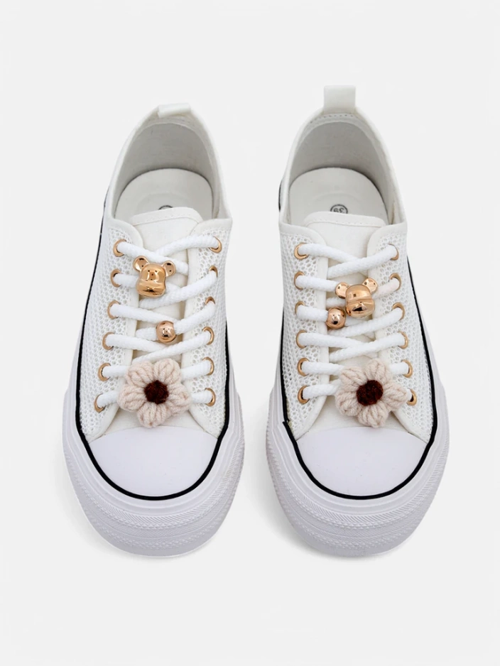 Royalfashion Women's perforated sneakers with embellishments Osdo