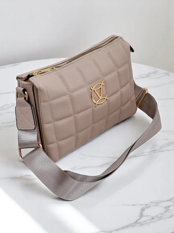 Royalfashion Clutch handbag for women with a quilted front