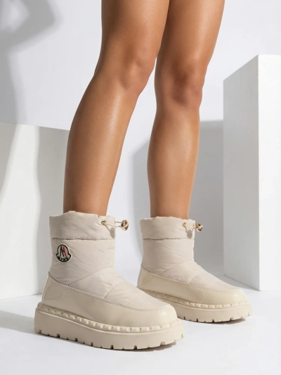 Royalfashion Women's slip-on snow boots in cream color Ireda