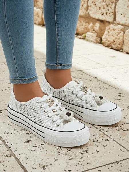 Royalfashion Women's perforated sneakers with embellishments Osdo